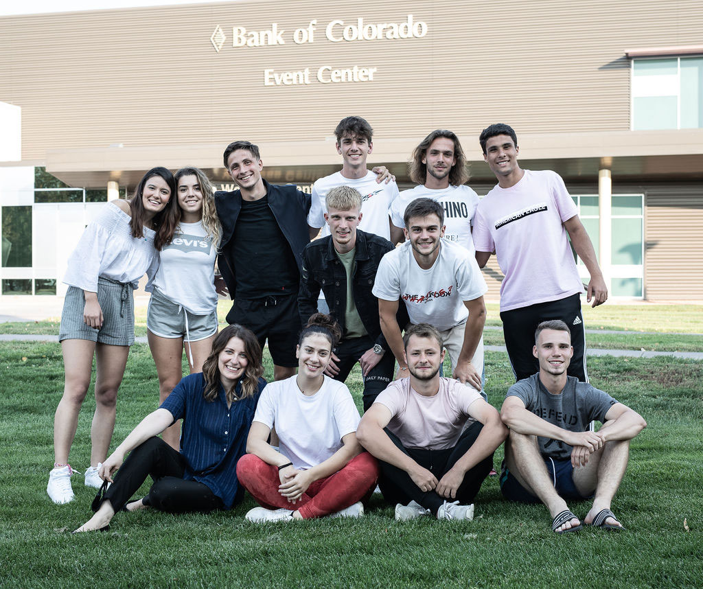International students in front of the Bank of Colorado Event Center at Northeastern Jr College