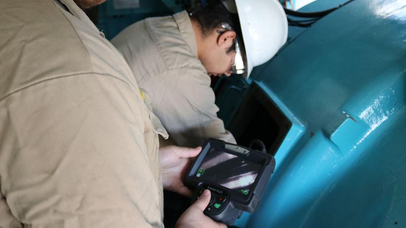 Students from Northeastern Junior College learn using borescope donated by NextEra Energy.