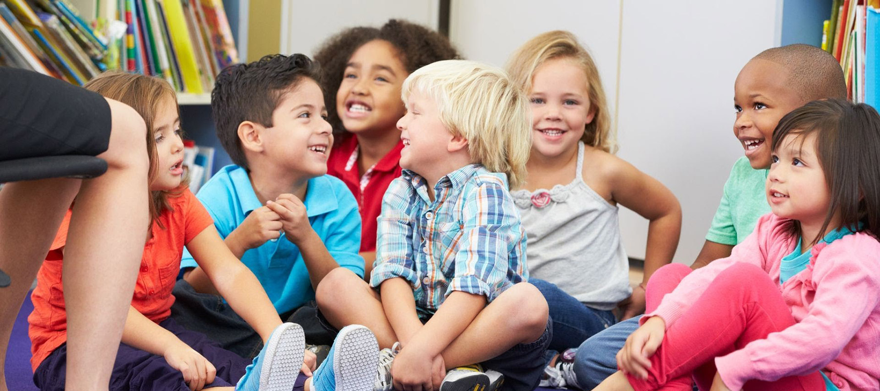 A smiling group of toddlers exemplifies the care and experience Northeaster's early childhood education program provides.