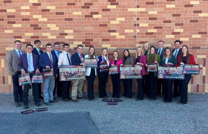 Livestock judging team posing for a picture 12 standing in first row and 6 standing in the second row. 2023 Fall Livestock Judging Contest- Casper, WY 