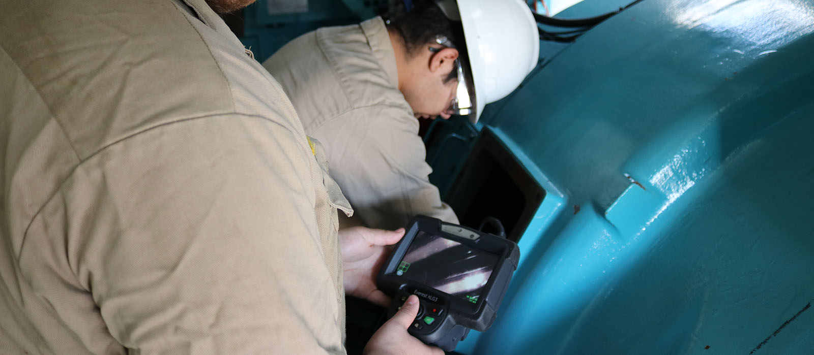 Students from Northeastern Junior College learn using borescope donated by NextEra Energy.