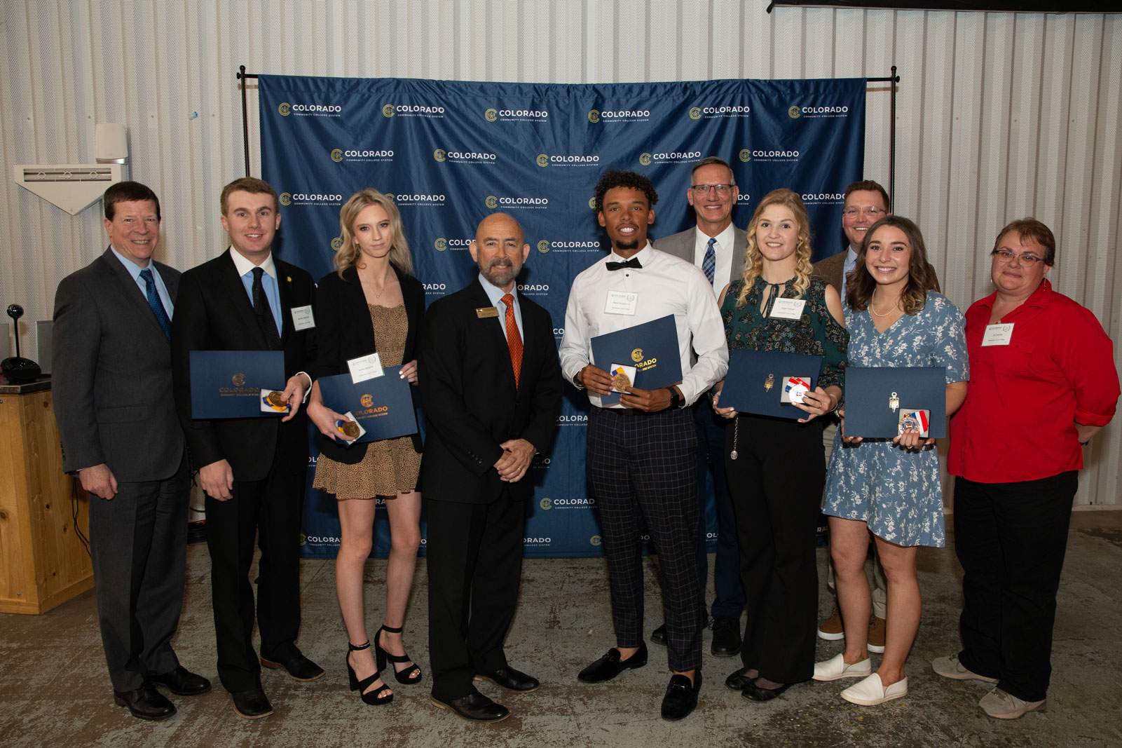 CCCS Student Awards picture featuring Mike White, Brandon Melnikoff, Noelle Meagher, Chancellor Joe Garcia, Steve Spurgeon, Steve Smith, Paige Finegan, Tim Stahley, Kat Marty, and Jeri Garrett