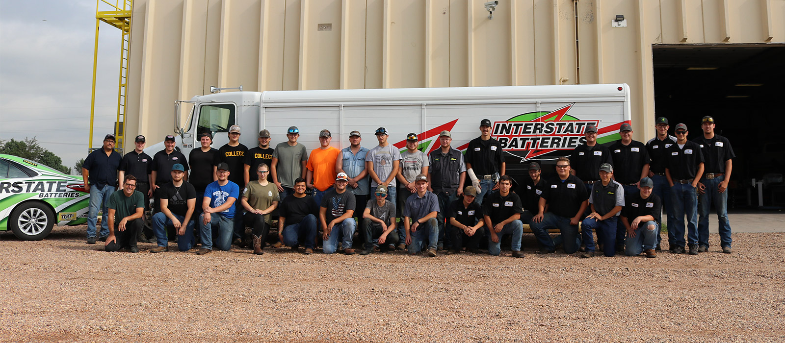 Northeastern Junior College Diesel Technology students post for a photo with representatives from Interstate Batteries of the Rockies.