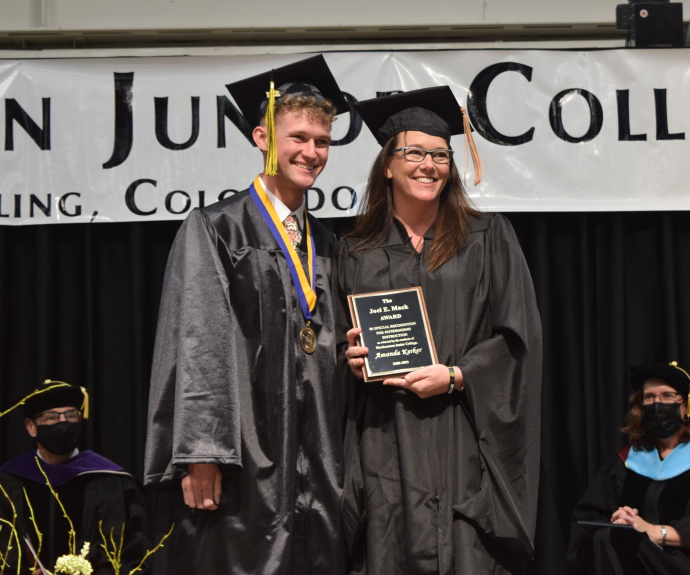 Garrett Cockroft presents the Joel E. Mack Award to Amanda Kerker