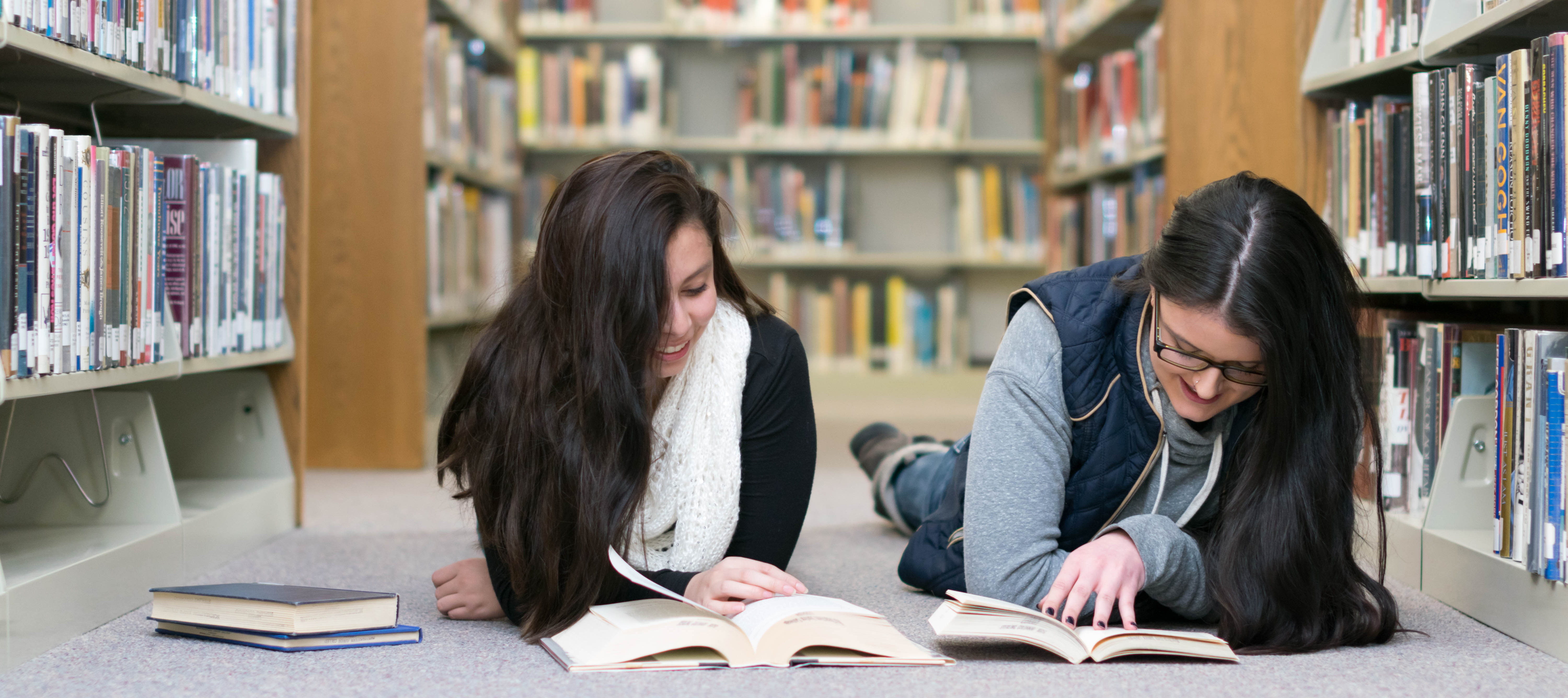 Students studying on the floor