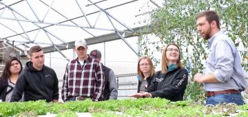 Class in greenhouse