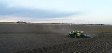 Tractor plowing a field