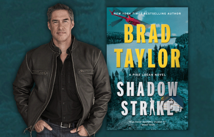 Author Brad Taylor with his book Shadow Strike