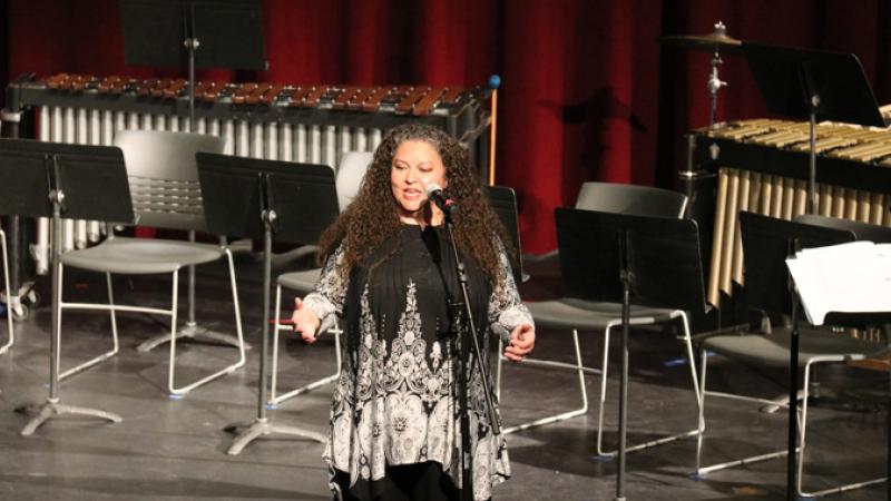 News-Celeste Delgado-Pelton addresses audience at Spring Ensemble 2022