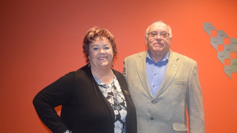 NJC Alumni Association Secretary Deb Walker congratulates President’s Award recipient Chip Steger at the Hoops Homecoming Awards Luncheon Saturday, Feb. 19, 2022. (Callie Jones/Sterling Journal-Advocate)