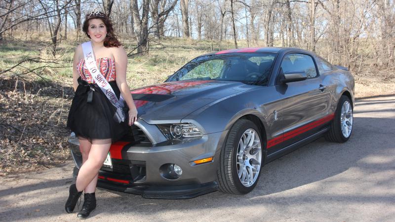 Katrina Sanchez of Colorado Springs is the 2015 NJC Auto Show queen. She is shown here with a 2014 Shelby GT500 owned by Marvin Stanley of Sterling.