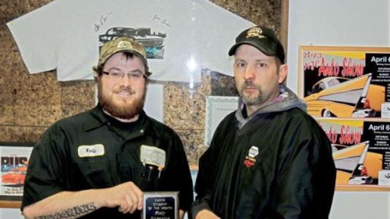 Pickering (left) is shown here receiving his award from Aaron Hettinger, outside sales manager for NAPA.