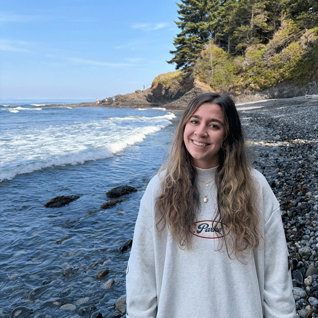 Andie Anderson NJC nursing student standing on a beach in Washington.