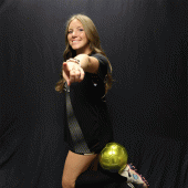 Kalissa Weich one of NJC's soccer players holding a soccer ball with her foot.