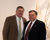 Mark Kokes, NJC Alumni Association board president, and Pathfinder Award recipient Roy Edwards