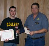 William Richendifer (left) receives the third place award for the USA Skills District Three competition frmo Layton Peterman (right) of NJC's automotive technology program.