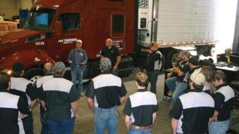 Warren Baker and Michael Job talking to Diesel Tech students