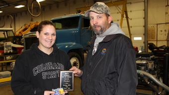  Laura Fincher of Sterling (left), the NAPA Student of the Month for October 2013, receives her award from Aaron Hettinger, the outside sales manager for NAPA.