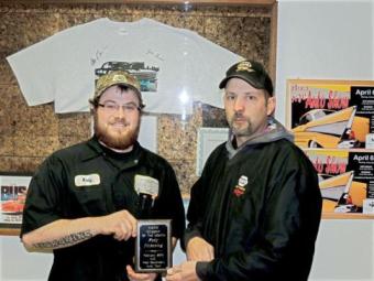 Pickering (left) is shown here receiving his award from Aaron Hettinger, outside sales manager for NAPA.